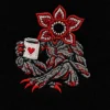 Вертикальное макро вышивки Demogorgon на чёрной футболке Friendly & Deadly